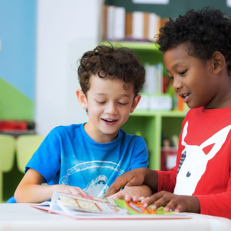 Student,In,International,Preschool,Reading,A,Magazine,Book,Together,In