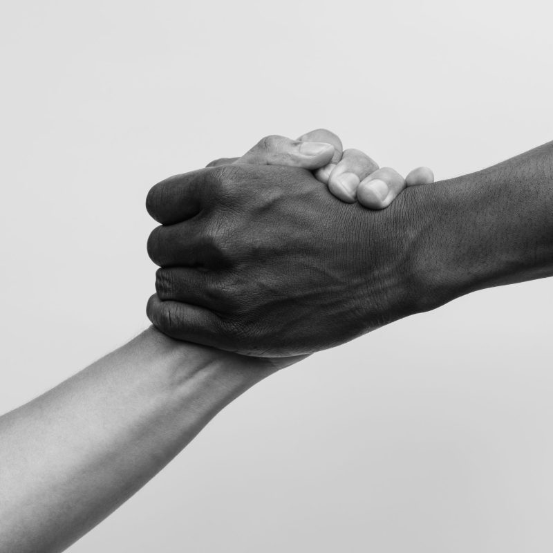 Helping,Hand,,Rescue,,Multiathnic,People,,Black,And,White,Image.